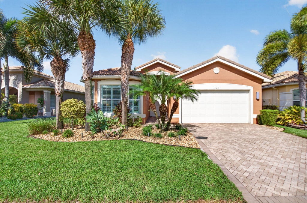 Photo of 11584 Dawson Range Road, Boynton Beach, FL 33473 (MLS # B26072322)