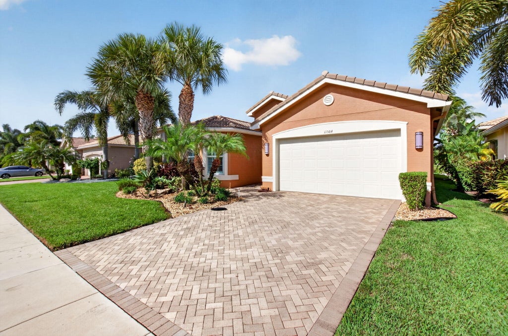 Photo of 11584 Dawson Range Road, Boynton Beach, FL 33473 (MLS # B26072322)