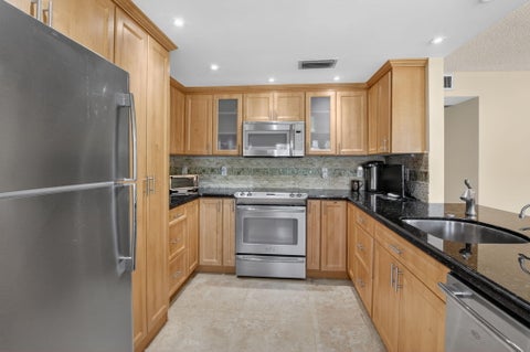 Photo of 1027 Yarmouth Drive #B, Boca Raton, FL 33434 (MLS # B26027869)
