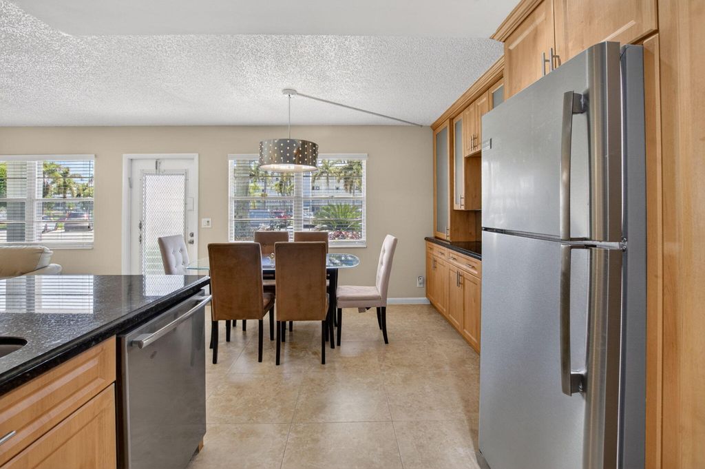 Photo of 1027 Yarmouth Drive #B, Boca Raton, FL 33434 (MLS # B26027869)