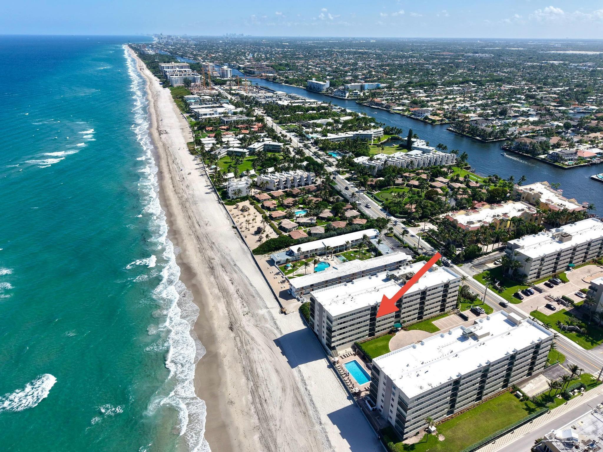 RARE. PET-FRIENDLY. ON THE SAND.One of the very few beachfront buildings on Hillsboro's famed ''Miracle Mile'' that allows PETS--a stretch known for its luxury estates and the lifestyles of the rich and famous. This unit sits just steps from the ocean with no A1A to cross. NE-facing 4th-floor condo with ocean views from your bed, impact glass throughout, gated entry, and private beach access.Two pools--one oceanfront, one Intracoastal--plus garage parking and a well-managed HOA with recent updates and strong reserves. Walk to Deerfield Pier dining and nightlife, minutes to Boca and Pompano. If you've been waiting for ''the one,'' this might be it--when it's gone, it's gone.