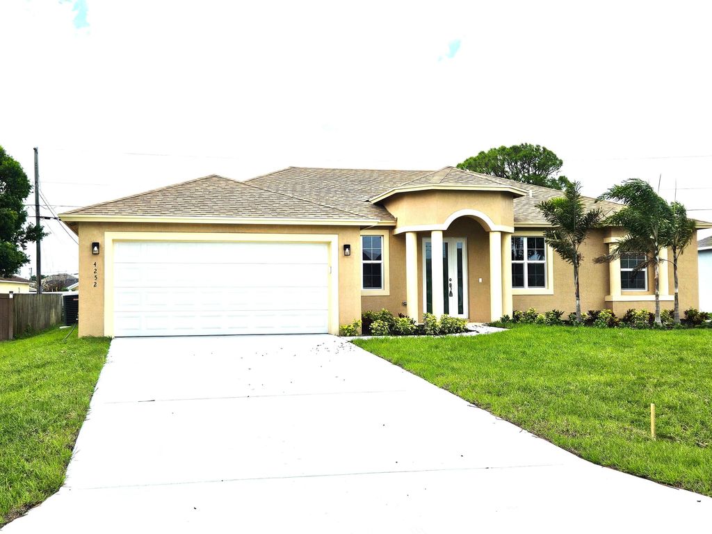 Photo of 4252 SW Muncie Street, Port Saint Lucie, FL 34953 (MLS # B26015552)