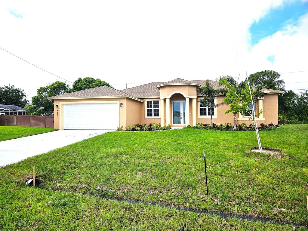 Photo of 4252 SW Muncie Street, Port Saint Lucie, FL 34953 (MLS # B26015552)