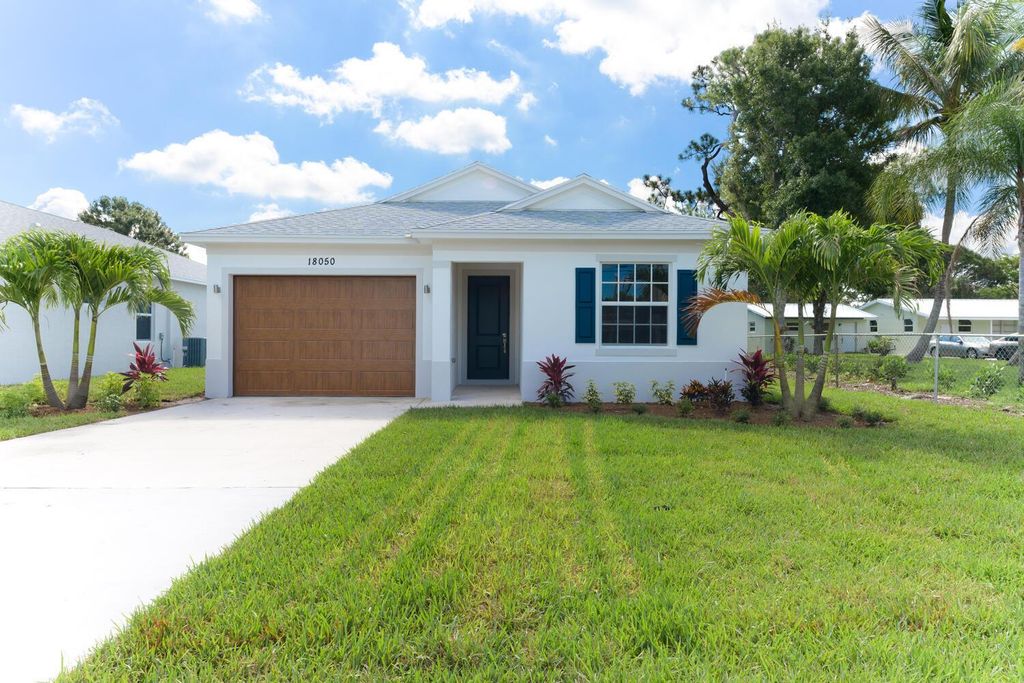 Photo of 18050 Limestone Creek Road, Jupiter, FL 33458 (MLS # R10905411)