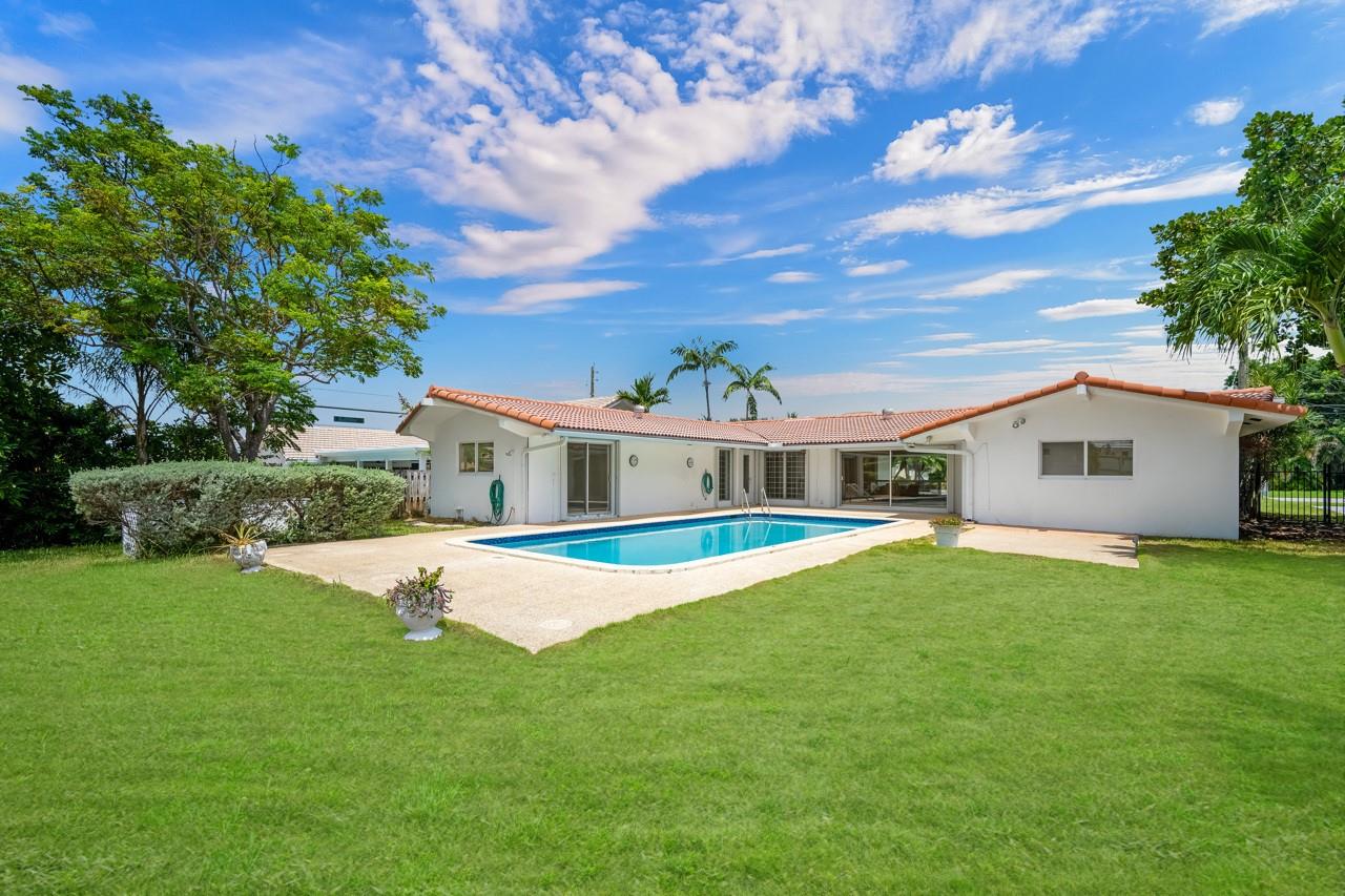A Dream Home comes to Market after 2 Generations... Dreaming of a Beach Cottage where you walk to your darling little Oceanfront Community of Restaurants, Shops and Bars? Walk to the Beach for Sunrise every Day? Drive your Golf Cart to the Supermarket or Coffee Shop? Lounge by your oversized deep water pool w/ huge fenced yard. Where the neighbors are friendly and lovely and kind? Then this is the Home for you!! Wonderful
3 Bed / 2.5 Bath home w/Split bedroom plan, each bedroom has a Walk in Closet, as well as another hallway walk in! Spacious Bright Living area w/ LOTS of Windows! The North Exposure is perfect! FULL Impact Windows and Accordian Shutters. Awesome Kitchen, 42" Cabinets, Granite, Stainless, Walk in Pantry, 2 Car Garage, Circular Drive, Good Roof, Auto Sprinkler, AMAZING!