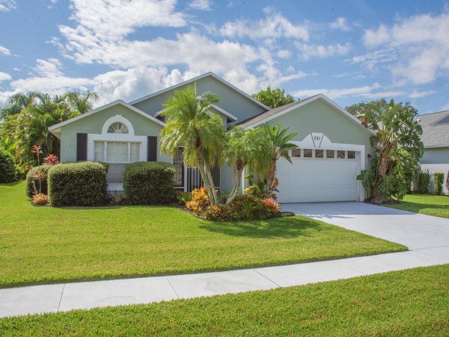 Enjoy your own private screened pool home, surrounded with tropical palms. Located in the popular gated Collier Club community in the city of Sebastian. The home features a brand new roof installed 8/2025! The kitchen features granite counters and SS appliances. A large Breakfast bar area will easily seat 4. Luxury vinyl plank throughout the home. An open floor plan enjoys views out to the pool with spill over water fall. A large covered screened patio allows plenty of protected out of doors space to enjoy the Florida lifestyle. Only a short drive to the pristine beach areas.  Don't delay see this gem of a home today.