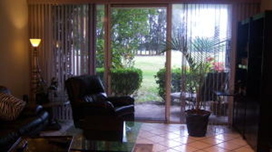 NO MEMBERSHIP REQUIRED. Maintenance fee includes cable and internet service, water.  Fully furnished 2bed/2full bath, complete with 46'' hdtv, genuine leather sofa and chairs.  Covered patio w/mosaic tiled floor facing the golf course. One mile east of Turnpike, 7 miles to ocean beach.  Own a piece of paradise in this well maintained golf community.  Washer/Dryer in unit.