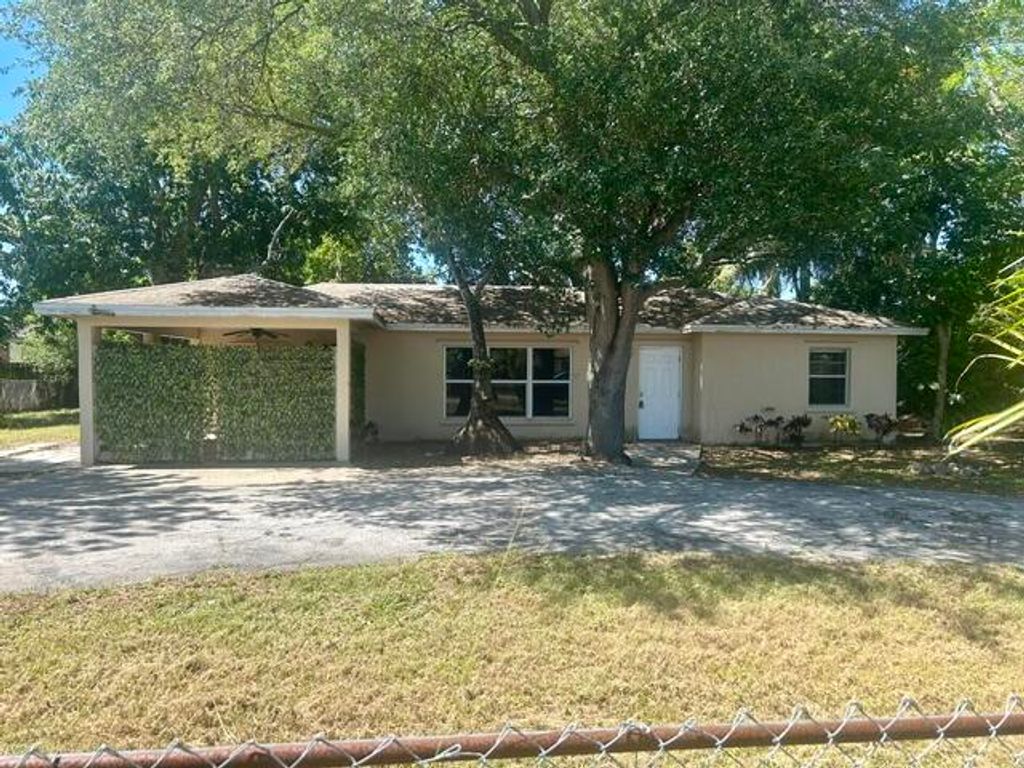 Photo of 4122 Bougainvillea Street, West Palm Beach, FL 33406 (MLS # B26026204)
