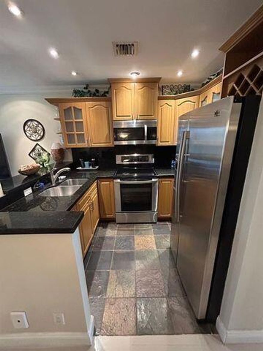 Stunning 1-Bedroom, Fully Renovated! Step inside this beautifully updated 1-bedroom condo and fall in love from the moment you enter. Located in an active, 55+ community, this home offers a perfect blend of modern comforts and a welcoming atmosphere. Enjoy serene garden views from your private screened-in balcony, ideal for relaxing or entertaining. This condo can be sold furnished or unfurnished, providing you with flexibility to move in with ease. Whether you're looking for peace and tranquility or engaging community activities, this property has something for everyone!