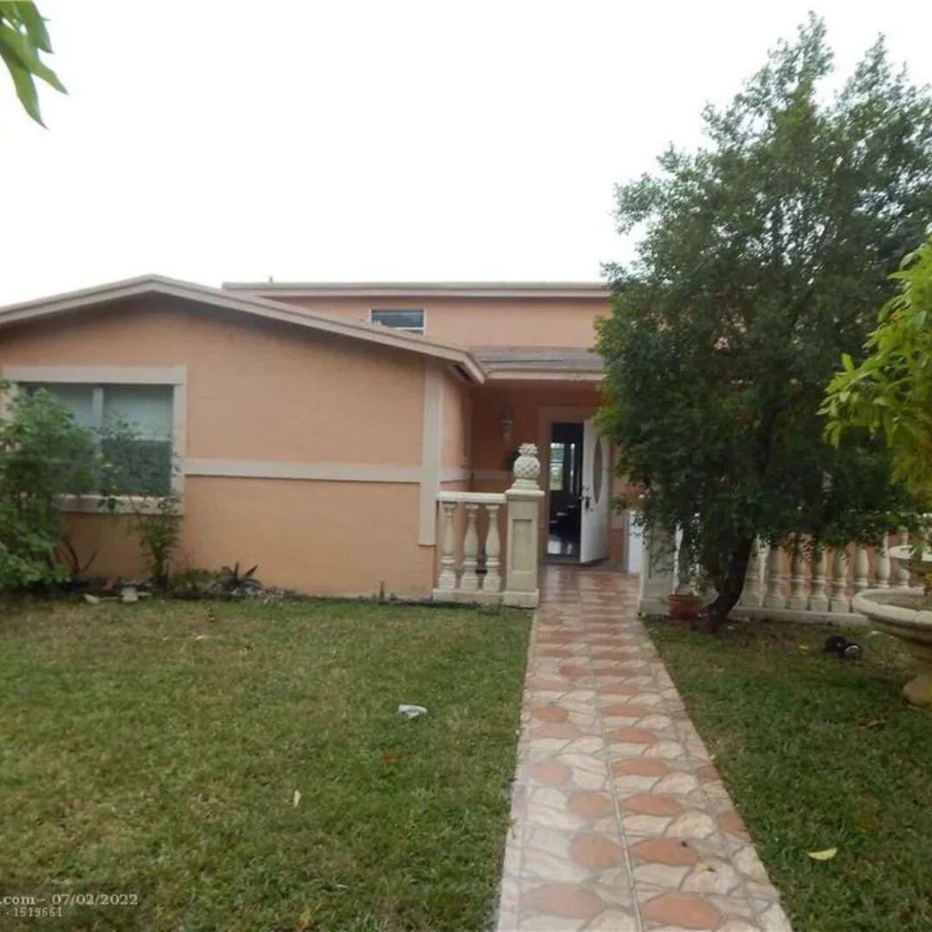 Photo of 3640 NW 39th Street, Lauderdale Lakes, FL 33309 (MLS # B26023105)