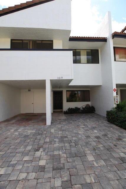Rarely available 3/2.5 townhouse with carport is now ready for the discerning client. Updated kitchen and baths, large format tile, new recessed lighting and fresh paint are just some of the upgrades that showcase this spacious home. Tons of natural light flood the 2000 SF living space. Enjoy covered patios off primary bedroom and family room, full size washer /dryer, paver driveway, and no neighbor on one side. Quiet neighborhood with community pool, centrally located in Coral Springs.