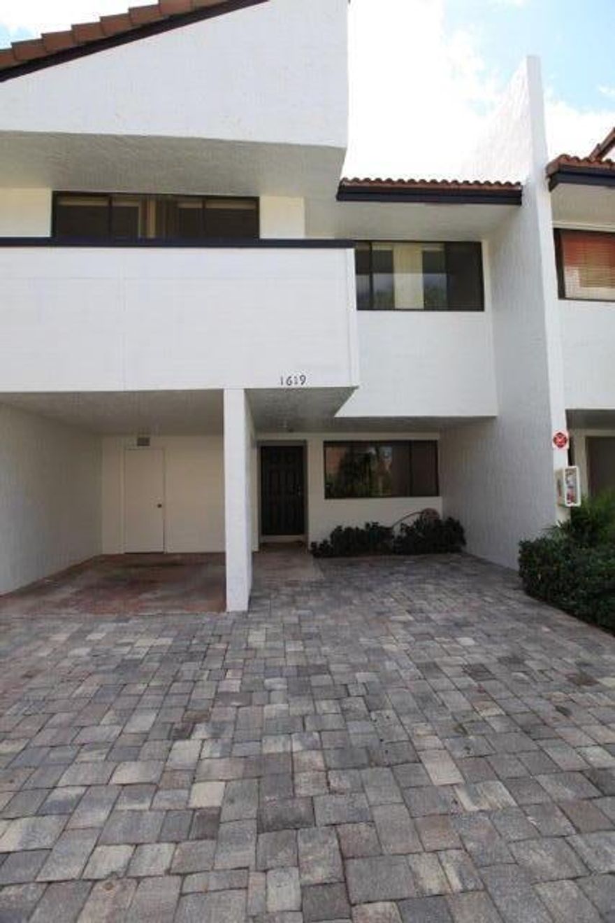 Rarely available 3/2.5 townhouse with carport is now ready for the discerning client. Updated kitchen and baths, large format tile, new recessed lighting and fresh paint are just some of the upgrades that showcase this spacious home. Tons of natural light flood the 2000 SF living space. Enjoy covered patios off primary bedroom and family room, full size washer /dryer, paver driveway, and no neighbor on one side. Quiet neighborhood with community pool, centrally located in Coral Springs.