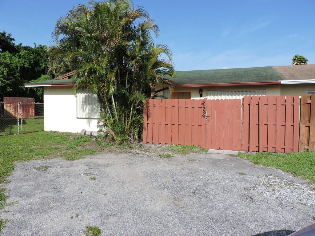Photo of 8599 Crater Terrace, West Palm Beach, FL 33403 (MLS # B26054657)