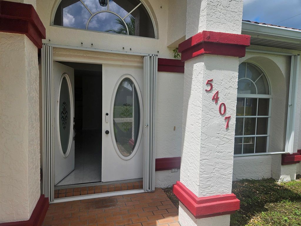 Photo of 5407 NW Chicopa Street, Port Saint Lucie, FL 34983 (MLS # R11124715)