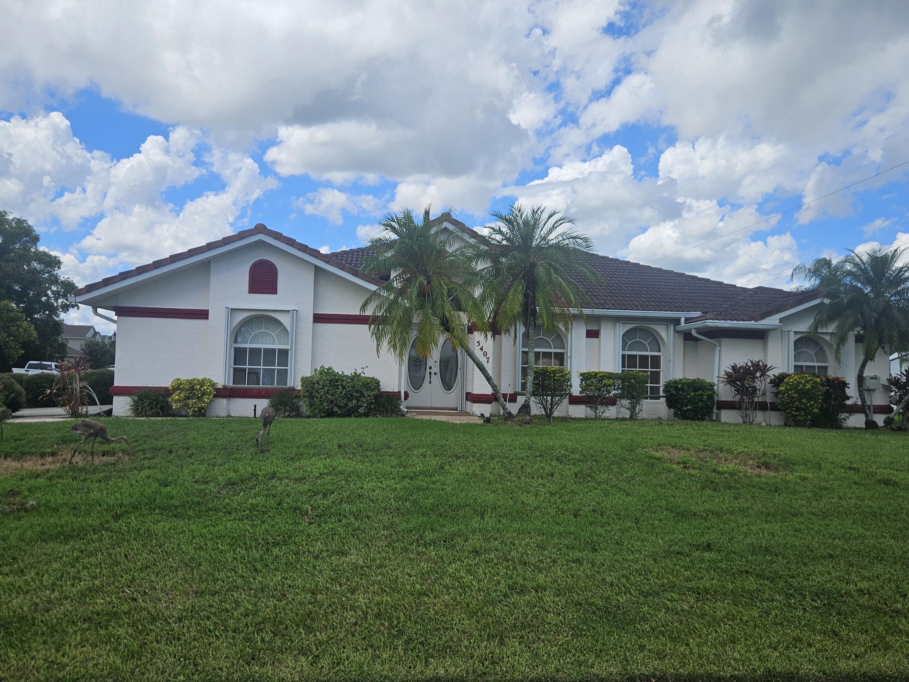 This spacious home is on a sweeping corner lot with a large patio and screened in pool. The home is vacant and there is no homestead at this time. Home is a great family home but needs some TLC.