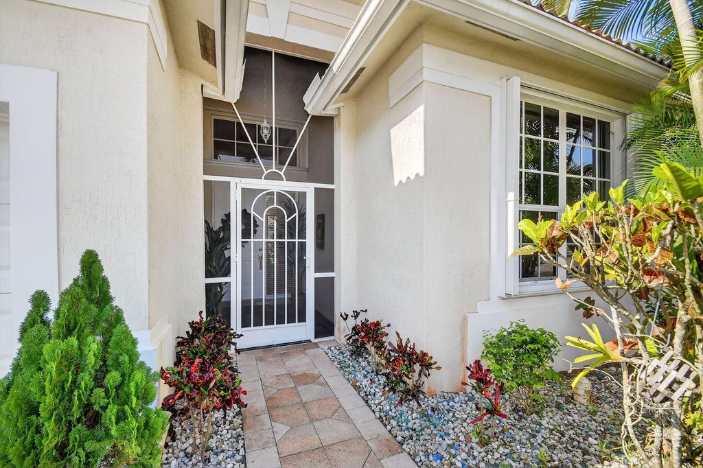 Photo of 8736 S San Andros, West Palm Beach, FL 33411 (MLS # B26004075)