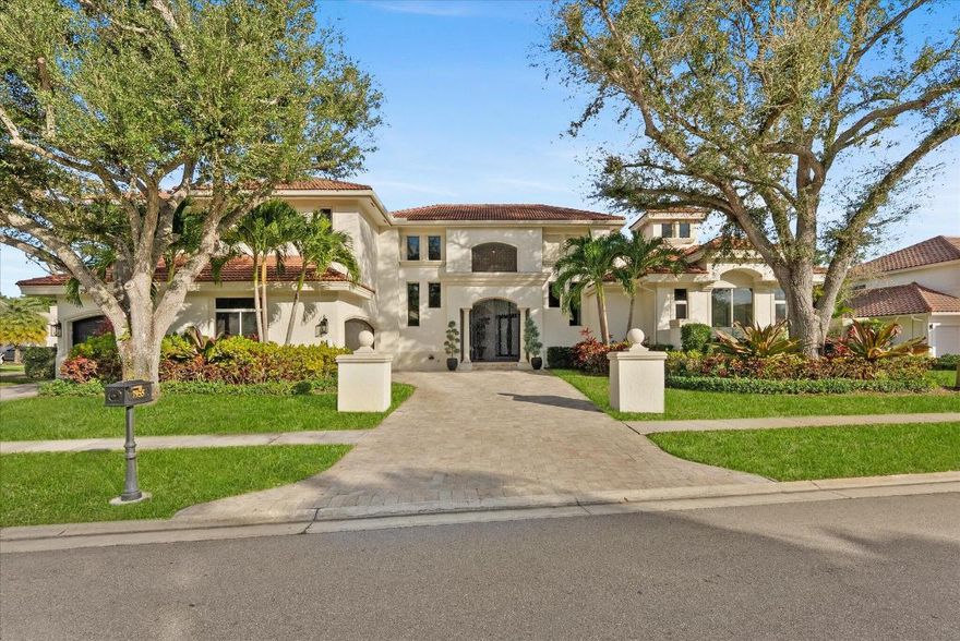 Located in Boca Grove, this two-story Mediterranean residence offers 5,249 living square feet with 5 bedrooms, 5 full baths, 2 powder rooms, plus a home office and private movie room. The home has been updated in many areas, including a renovated kitchen with Wolf appliances, select impact-rated doors and windows, smart home system, and updated ensuite bathrooms. Additional features include built-in cabinetry, electric fireplace, four new HVAC compressors with new upstairs ductwork, EV charger, and recent interior and exterior enhancements. The primary suite offers flexibility for future customization. Enjoy a private backyard with in-ground pool, a 3-car garage, and a location within walking distance to a house of worship in one of Boca Raton's most established private club communities.