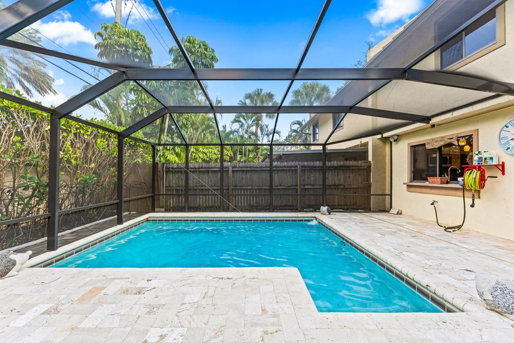 Photo of 1075 Raintree Lane, Palm Beach Gardens, FL 33410 (MLS # R11145670)