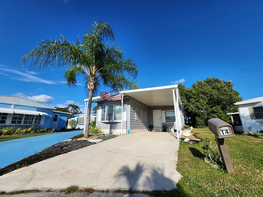 Photo of 14 Brisa Lane, Port Saint Lucie, FL 34952 (MLS # R11054647)