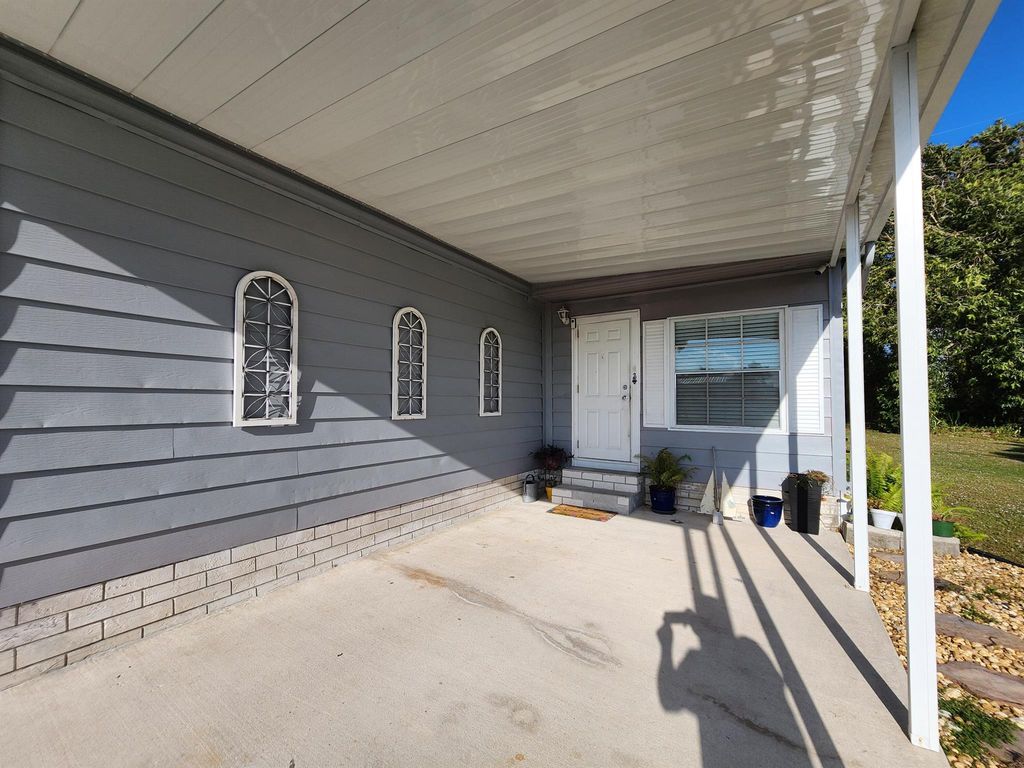 Photo of 14 Brisa Lane, Port Saint Lucie, FL 34952 (MLS # R11054647)