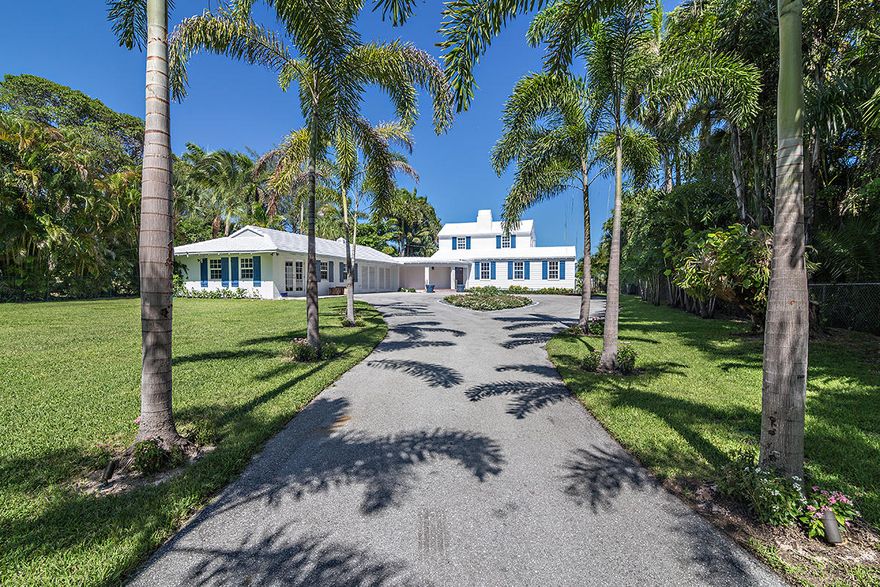 Located in Prospect Park and situated on an oversized 1.03+ acre lot directly on the Intracoastal waterway rests this charming 4,500 square foot Hamptons-style home with 5 bedrooms and 4 bathrooms.  New impact windows and sliders have been added to the main house allowing for wide water views overlooking the island of Palm Beach.  In the recent past, the kitchen, A/C and bathrooms have been renovated/ replaced.  Close to area beaches, PBI airport, downtown WPB, Worth Ave and in the Palm Beach Public Elementary School District.  Home is move-in ready or ready for an addition/ transformation.
