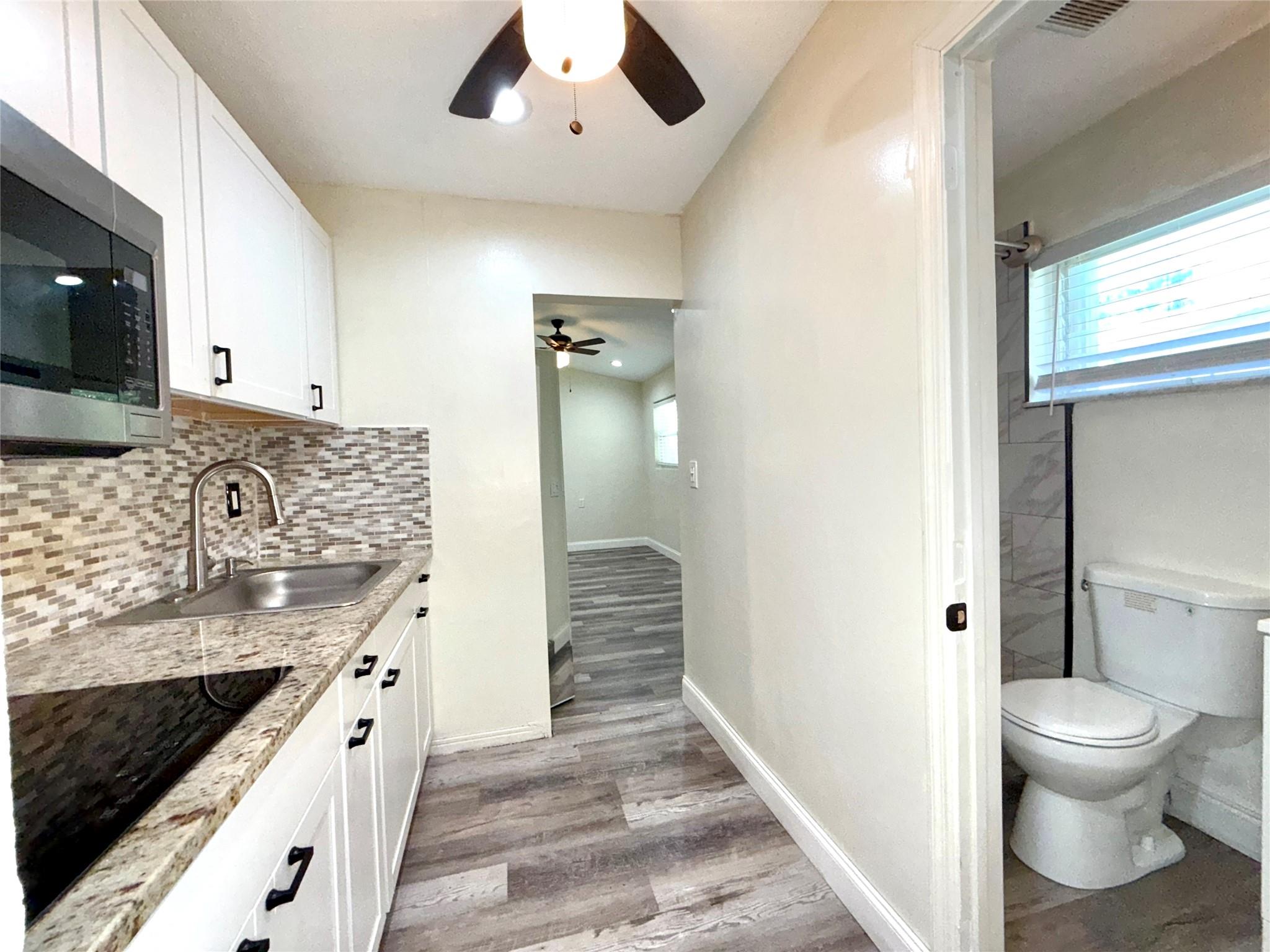 ALL INCLUSIVE: Completely renovated unit, from ceiling to floor. Enjoy recently installed flooring, recessed lights, AC, upgraded bathroom and kitchenette. All in private, with a private entrance - no sharing. Water, Electric, Lawn, and Pest Control are all included in one flat rent. Save yourself on connection fees, misc. charges, contracts, deposits, and multiple hard inquiries on your credit. Just moments away from 95, restaurants, shopping, and groceries. Vacant, ready for immediate move in with fast approval.