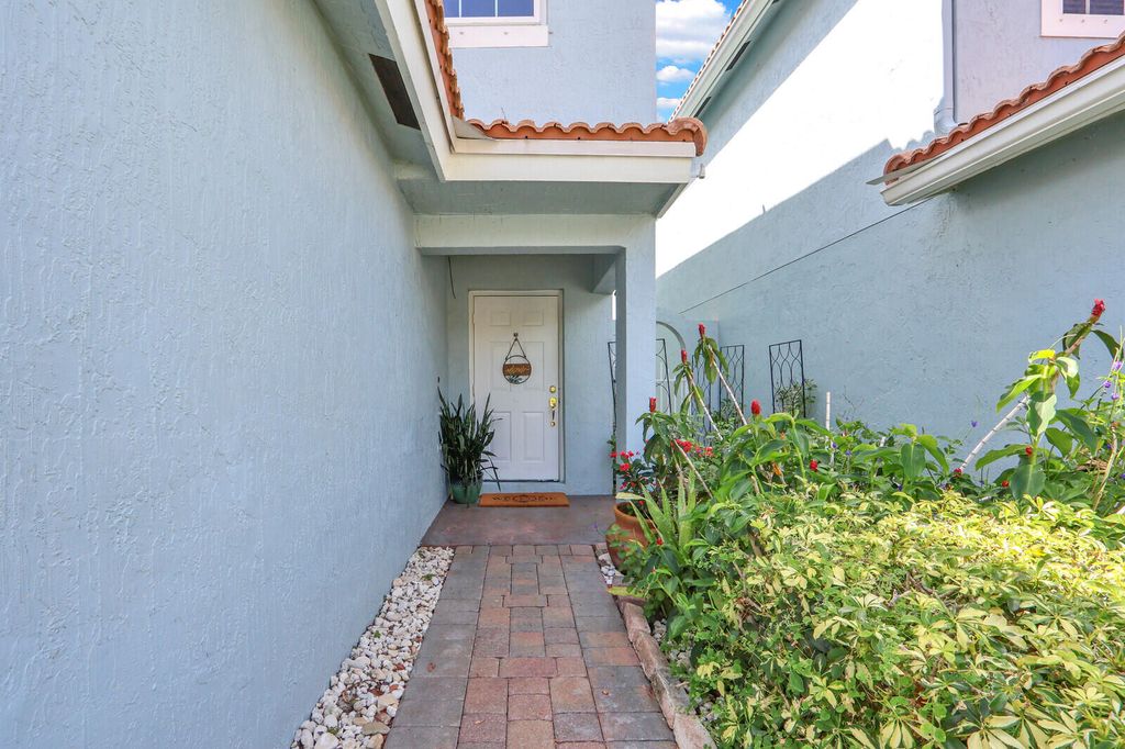 Photo of 3300 Commodore Court, West Palm Beach, FL 33411 (MLS # B26030613)