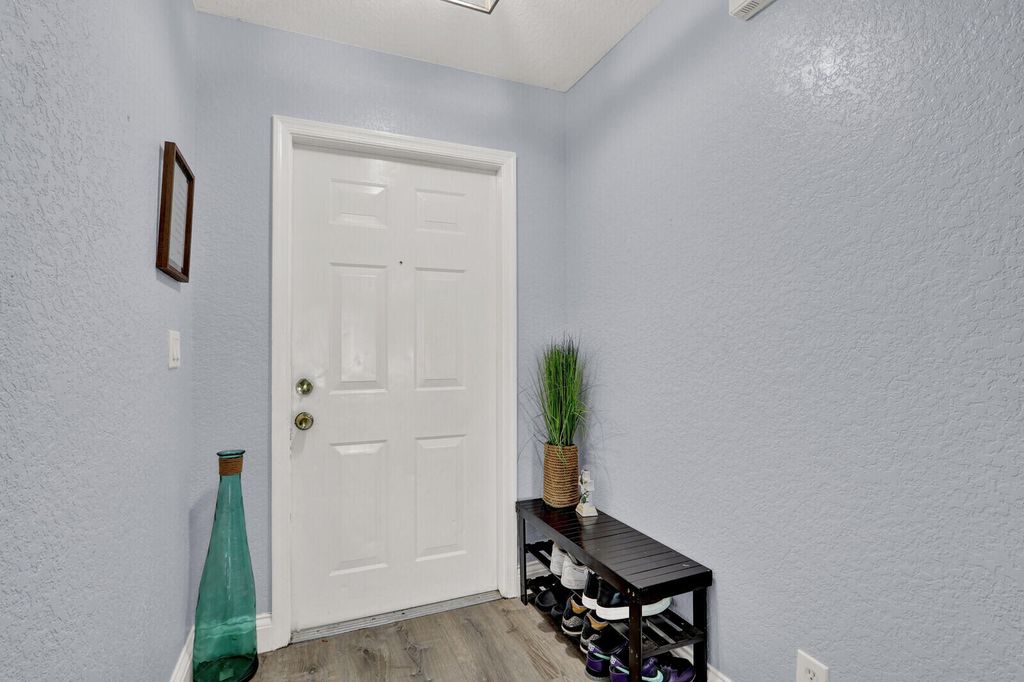 Photo of 3300 Commodore Court, West Palm Beach, FL 33411 (MLS # B26030613)