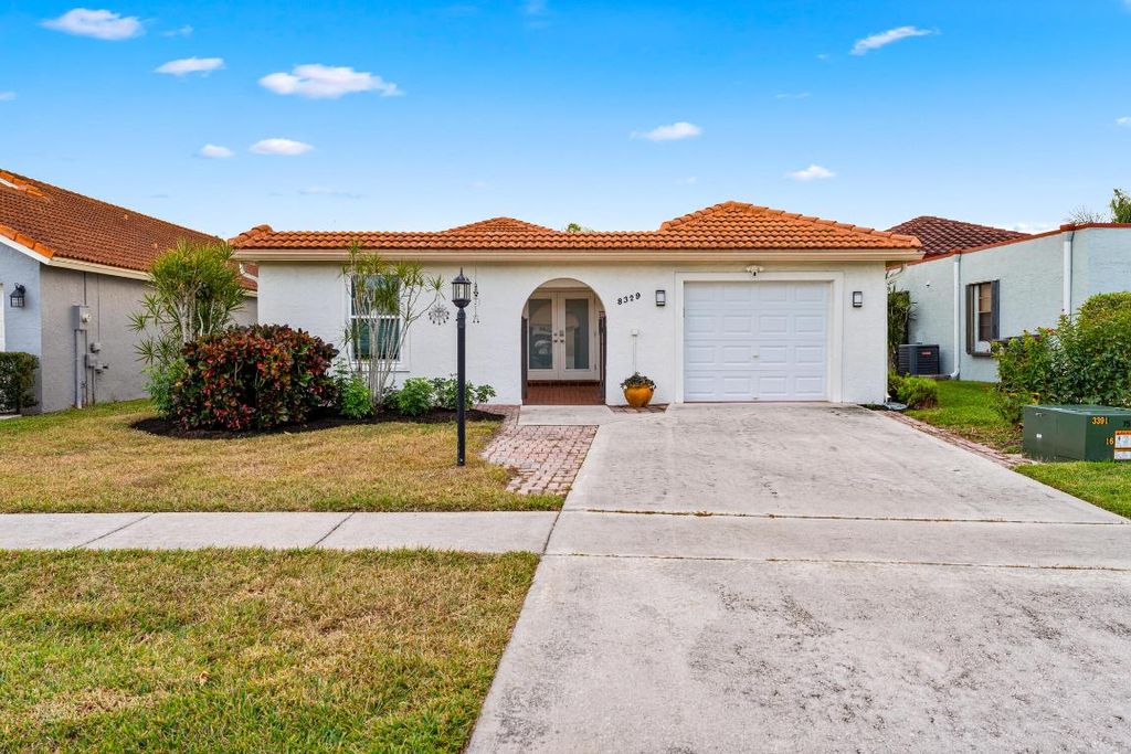 Photo of 8329 Bonita Isle Drive, Lake Worth, FL 33467 (MLS # R11152900)