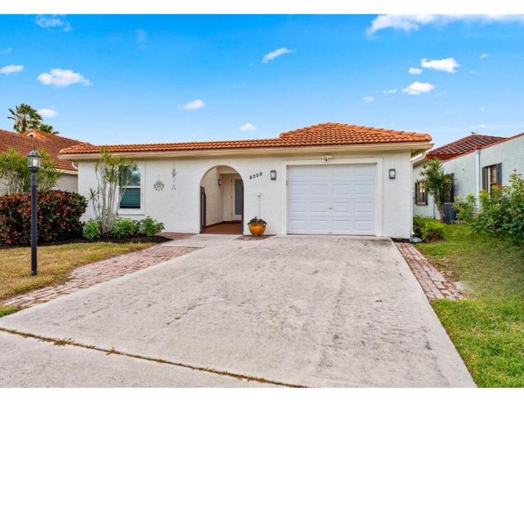 Photo of 8329 Bonita Isle Drive, Lake Worth, FL 33467 (MLS # R11152900)