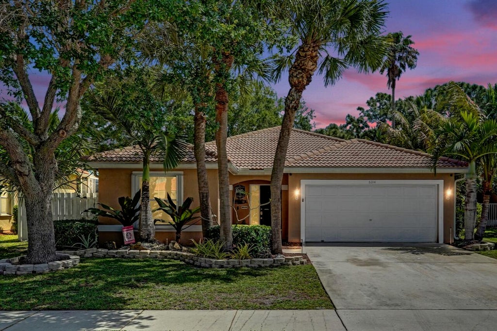 Photo of 6214 SAND HILLS Circle, Lake Worth, FL 33463 (MLS # B26088694)