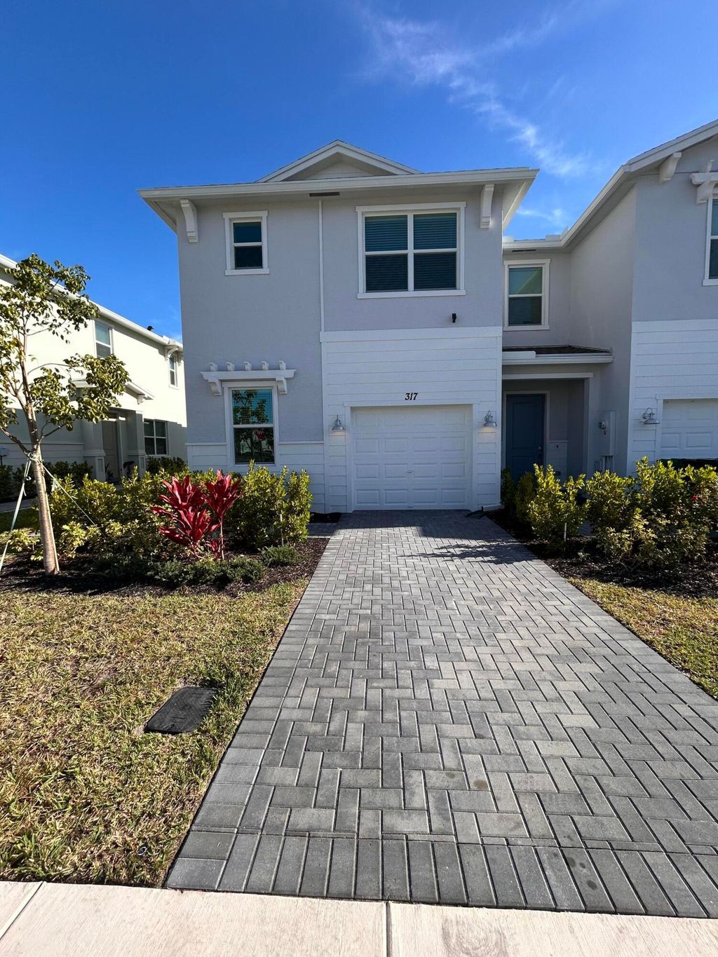 Photo of 317 SE Crossoak Lane, Port Saint Lucie, FL 34984 (MLS # R11149409)