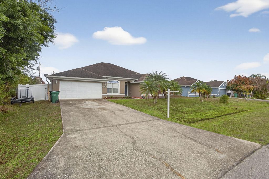 Photo of 1618 SW Nervia Avenue, Port Saint Lucie, FL 34953 (MLS # R11162627)