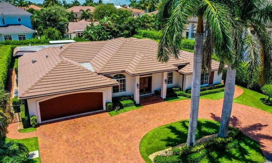 Come home to this beautiful 4,546 sq ft house located in Royal Palm Yacht and Country Club. This 3 bedroom, 3.5 bathroom residence features a den and recently renovated kitchen and bathrooms. Impact windows allow for abundant natural light. Your spacious living and dining areas are excellent for entertaining guests. There are dark cherry floors throughout and a private pool next to the putting green in the backyard. Additionally, there is a two car garage with extra space for storage and a laundry room with a second refrigerator. The residence is just minutes from Mizner Park and the beaches. Schedule a showing today! 6 month minimum