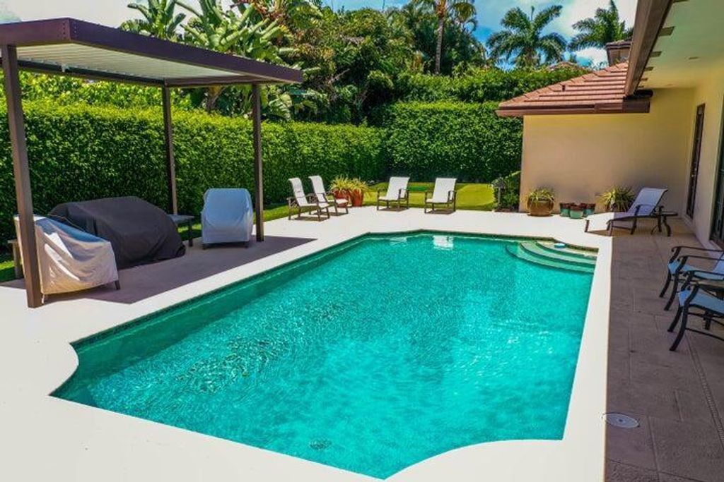 Photo of 2121 Areca Palm Road, Boca Raton, FL 33432 (MLS # R11009890)