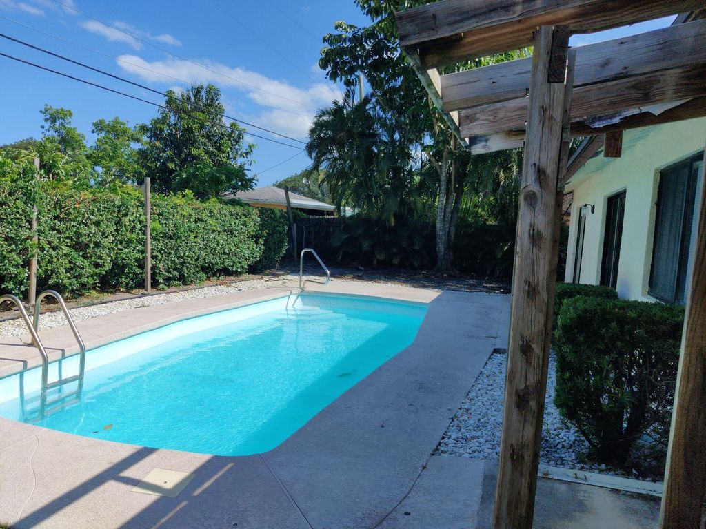 Photo of 609 White Water Drive, West Palm Beach, FL 33413 (MLS # B26010882)