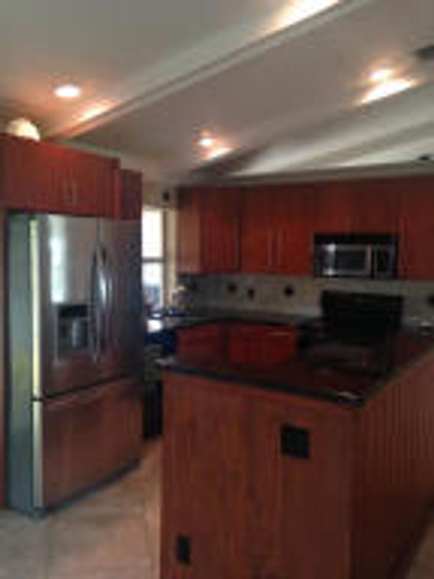 This House is a must see.   Upgrades galore, Stainless steel Appliances, granite, Crown Molding, Eucalyptus wood doors and much , much more!  Oversized lot with fenced in backyard and a screened in patio area perfect for Dining outside!