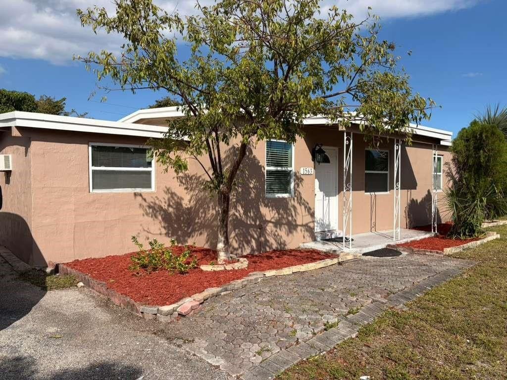Photo of 1563 NE 51st Street, Pompano Beach, FL 33064 (MLS # F10551100)