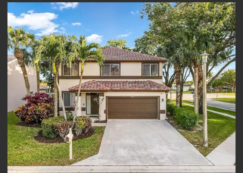 Photo of 10726 Palm Springs Drive, Boca Raton, FL 33428 (MLS # F10470422)