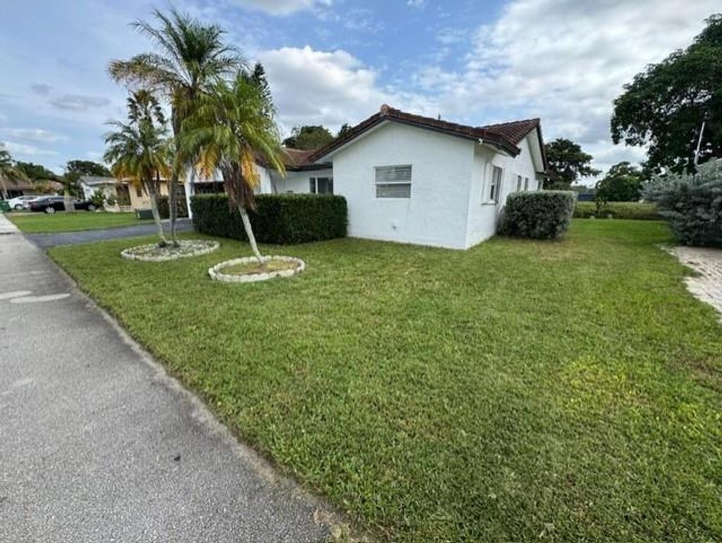 Photo of 7610 NW 66th Ter, Tamarac, FL 33321 (MLS # F10539997)