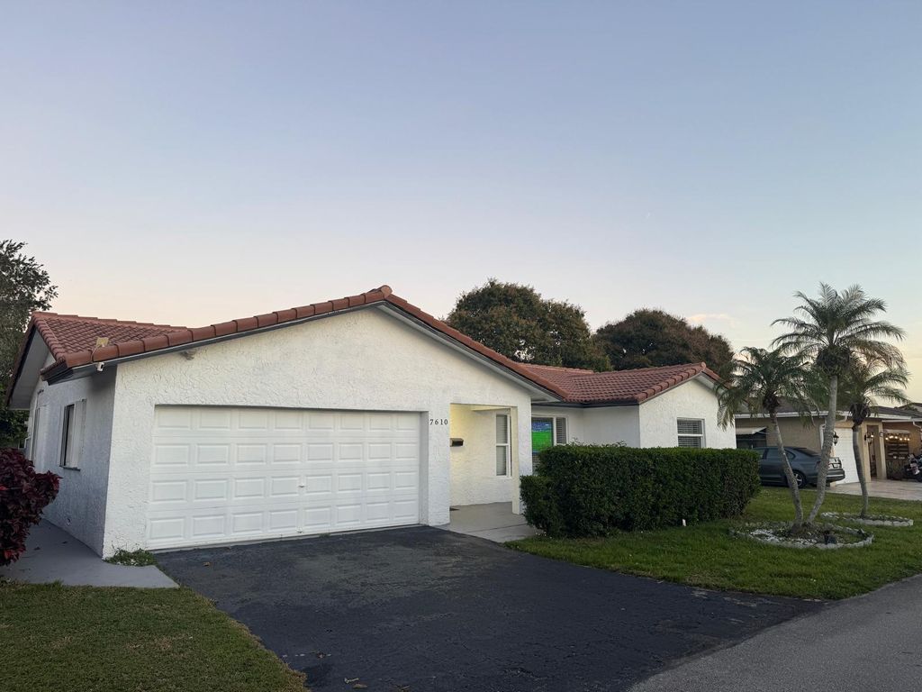 Photo of 7610 NW 66th Ter, Tamarac, FL 33321 (MLS # F10539997)
