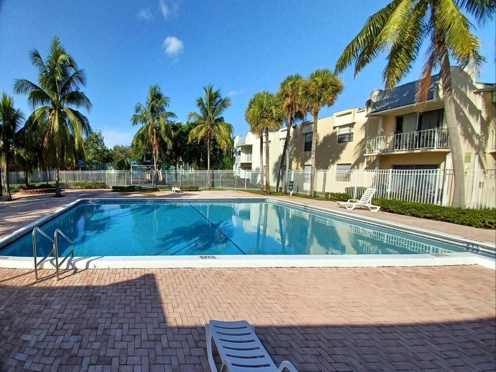 Photo of 409 Executive Center Drive #209, West Palm Beach, FL 33401 (MLS # B26029264)