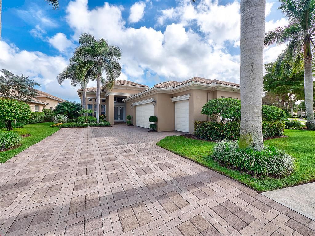 Photo of 143 Orchid Cay Drive, Palm Beach Gardens, FL 33418 (MLS # R10584194)
