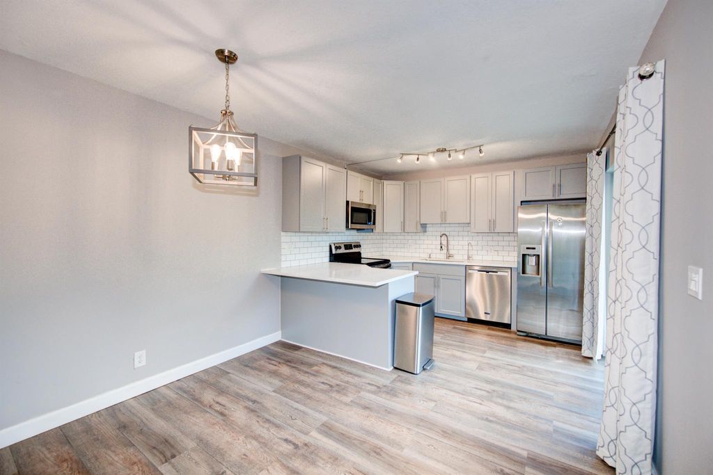 Photo of 5776 SE Riverboat Drive, Stuart, FL 34997 (MLS # R10937442)