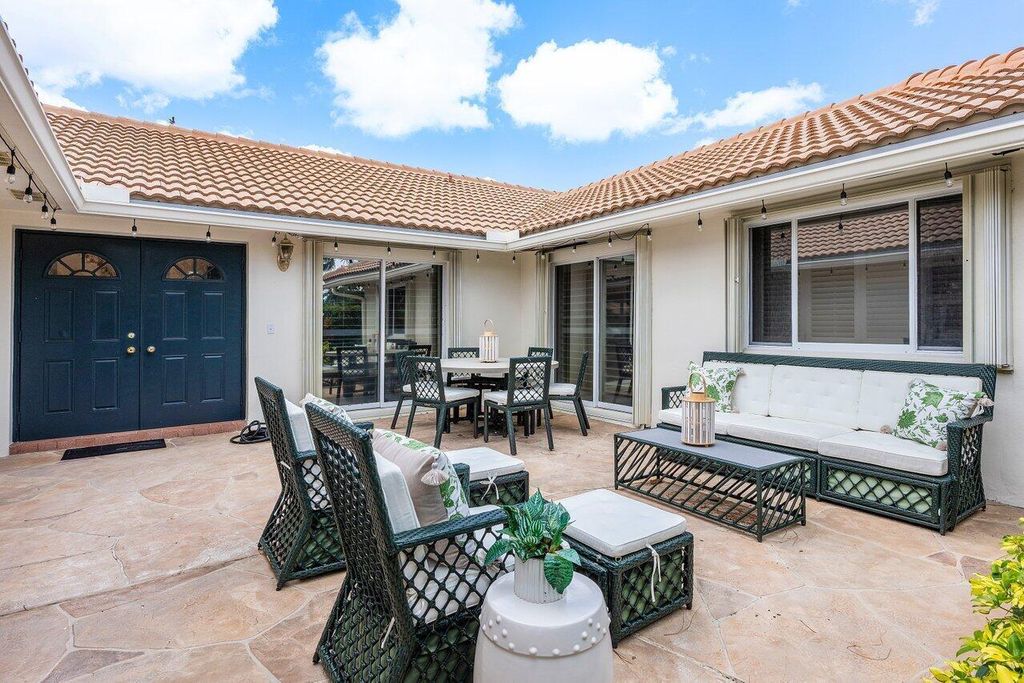 Photo of 4511 Meadowlark Lane, Boynton Beach, FL 33436 (MLS # B26011700)