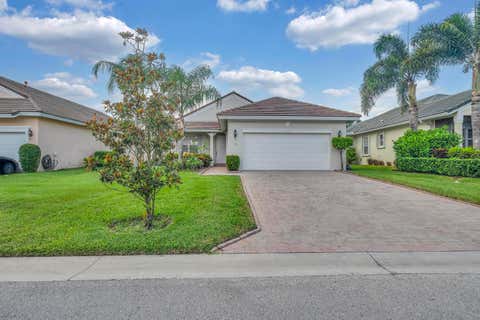 Photo of 113 NW Swann Mill Circle, Port Saint Lucie, FL 34986 (MLS # B26050057)