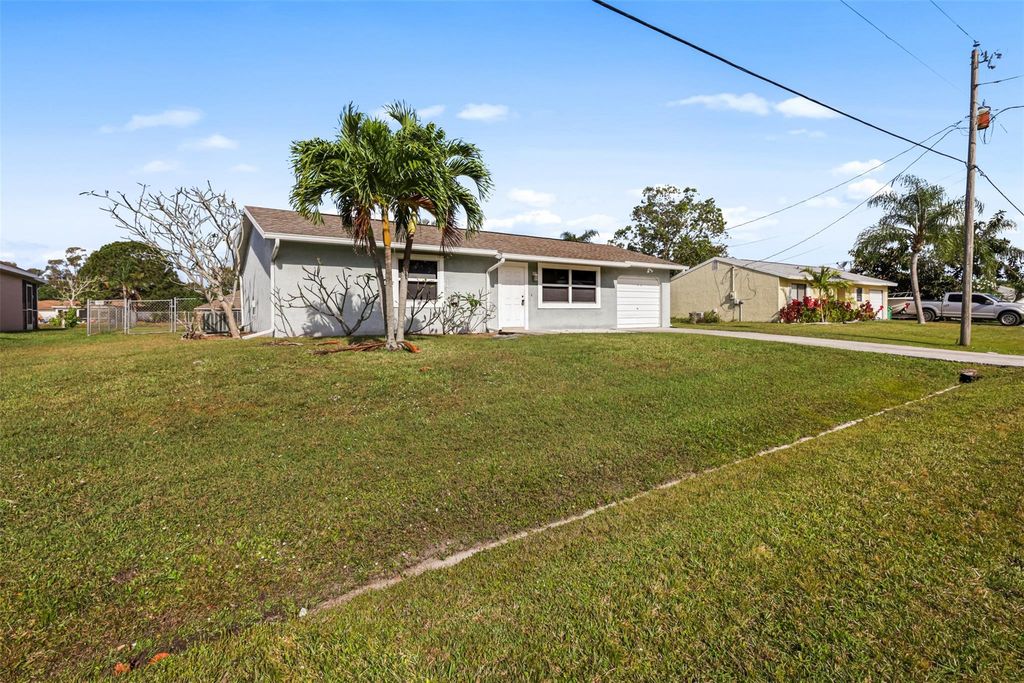 Photo of 2356 SE Marius Street, Port Saint Lucie, FL 34952 (MLS # F10432354)