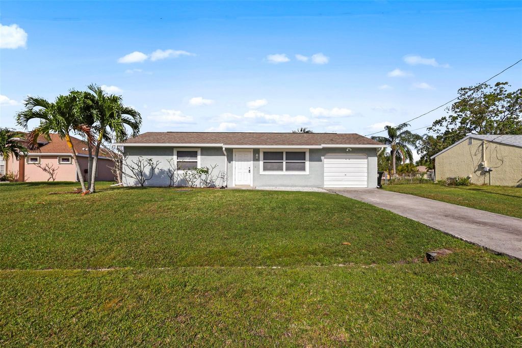 Photo of 2356 SE Marius Street, Port Saint Lucie, FL 34952 (MLS # F10432354)