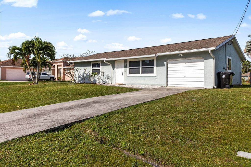 Photo of 2356 SE Marius Street, Port Saint Lucie, FL 34952 (MLS # F10432354)