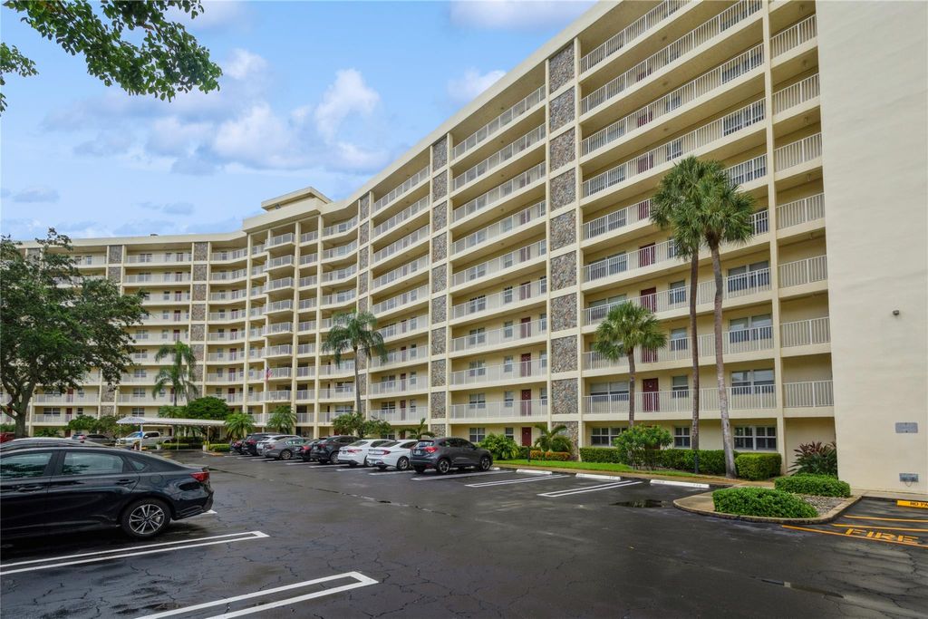 Photo of 3095 N Course Dr #211, Pompano Beach, FL 33069 (MLS # F10395173)